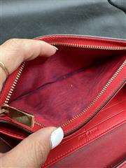 CHRISTIAN LOUBOUTIN POCHETTE WRISTLET